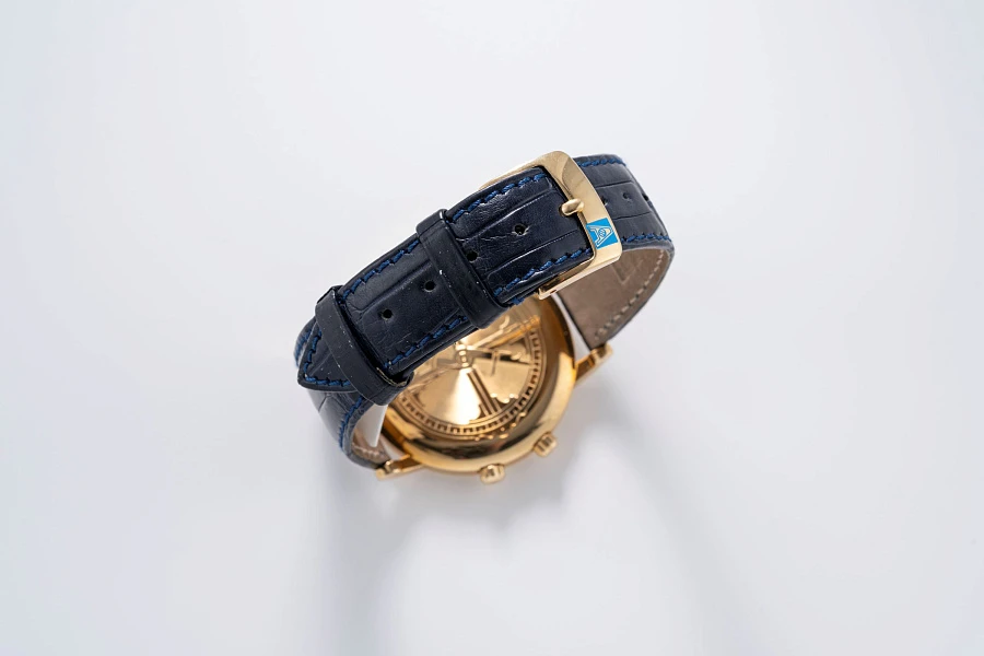 World Time in 18k Yellow Gold