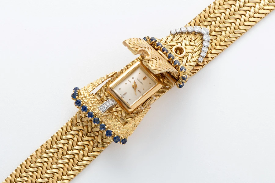 Bracelet Watch in 18k Yellow Gold with Diamonds and Sapphires