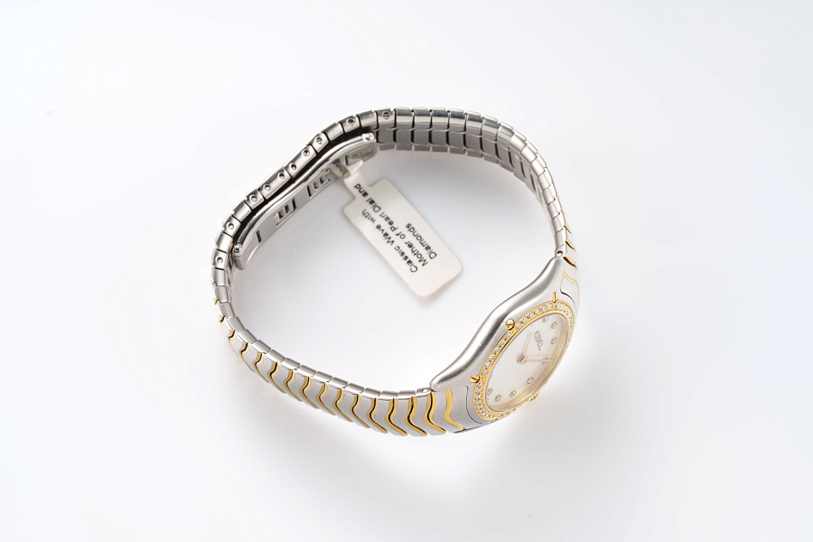 Classic Wave with Mother of Pearl Dial and Diamonds