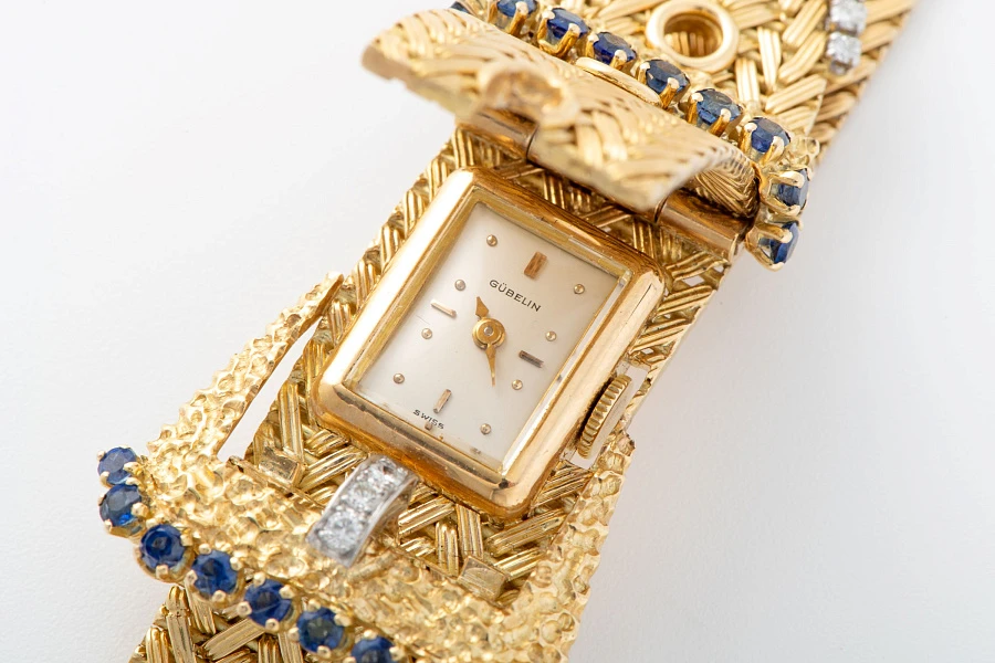 Bracelet Watch in 18k Yellow Gold with Diamonds and Sapphires